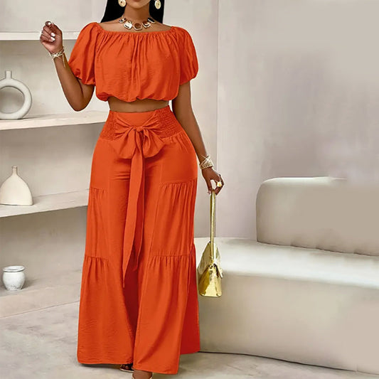Zweiteiliges Set aus Off-Shoulder-Oberteil mit Puffärmeln und weiten Hosen – Elegant, bequem und perfekt für Sommertage ☀️