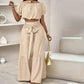 Zweiteiliges Set aus Off-Shoulder-Oberteil mit Puffärmeln und weiten Hosen – Elegant, bequem und perfekt für Sommertage ☀️