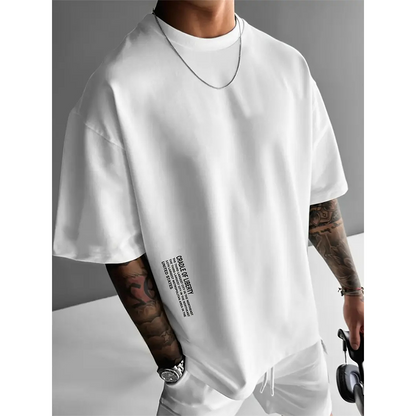 💥👕【2026er Neukollektion – jetzt mit 50 % Rabatt】 LOSE FIT – VOLLE BEWEGUNGSFREIHEIT. Kurzarm-Shirt für Männer. Urban Style, atmungsaktiv & alltagstauglich. Ob Stadt, Couch oder Café – du siehst immer gut aus. ⚡🌆